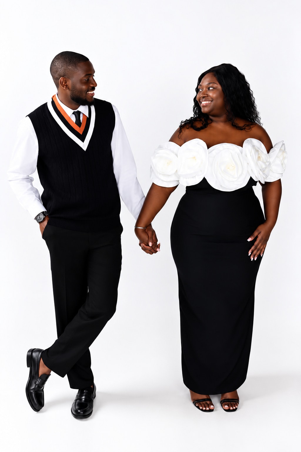 Wilfried et Alida main dans la main, se souriant